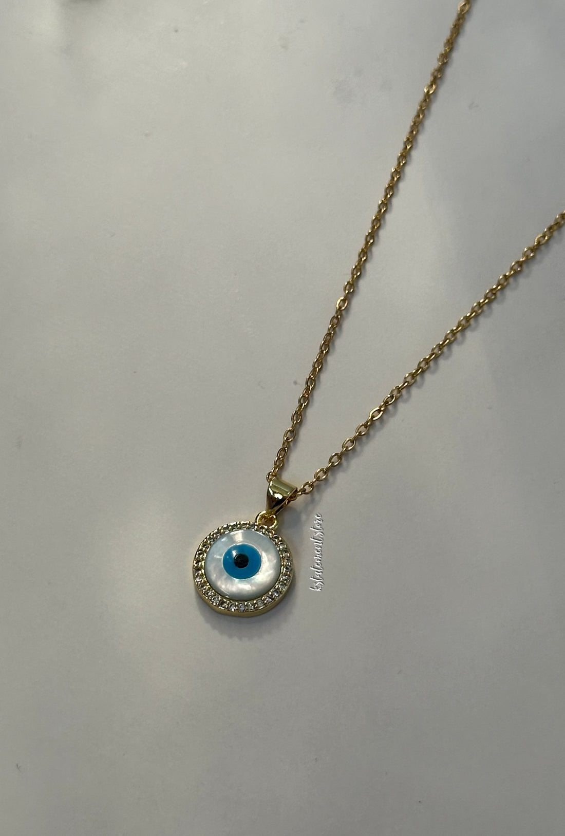 Collar de mal de ojo azul claro
